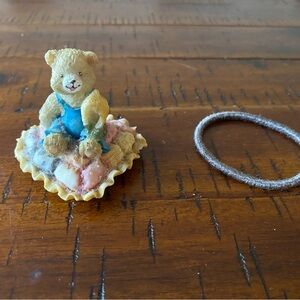 Adorable Teddy Bear Figurine with Blue Overalls